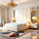 Luxurious bedroom with a chandelier, bed, and decorative elements.