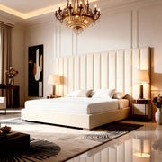 Luxurious Brixia bedroom with a large bed, chandelier, and decorative elements.