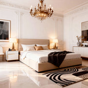 Luxurious bedroom with a chandelier, bed, and decorative elements.