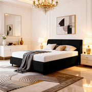 Modern bedroom with a black Belsogno bed, white bedding, and decorative elements.