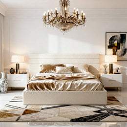 Modern bedroom with a chandelier, bed, and side tables.