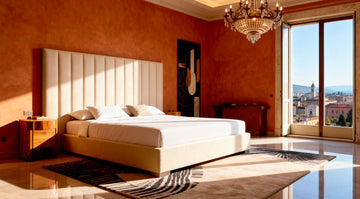 Luxurious Belsogno bedroom with a large bed, orange walls, and a chandelier ovelooking Brescia